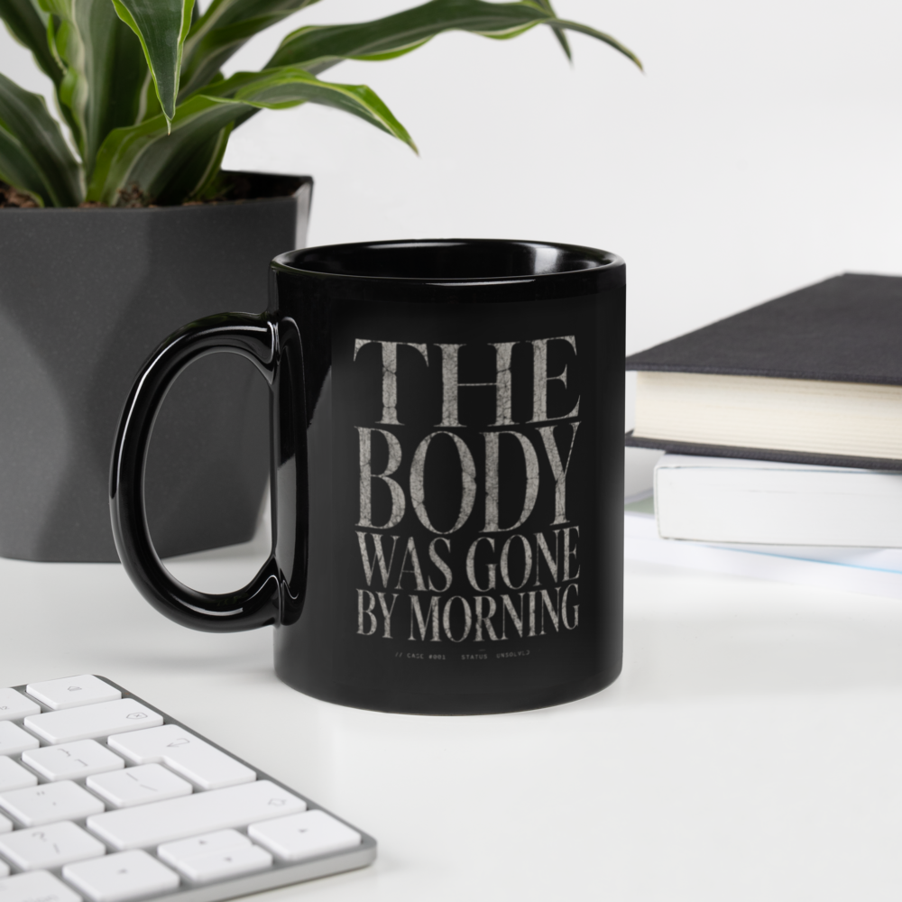 The Body Was Gone by Morning Black Christian Mug – 11 oz — black, left handle on left. Gospel Noir Christian coffee mug by Heavenly Crafted, Bible verse coffee mug