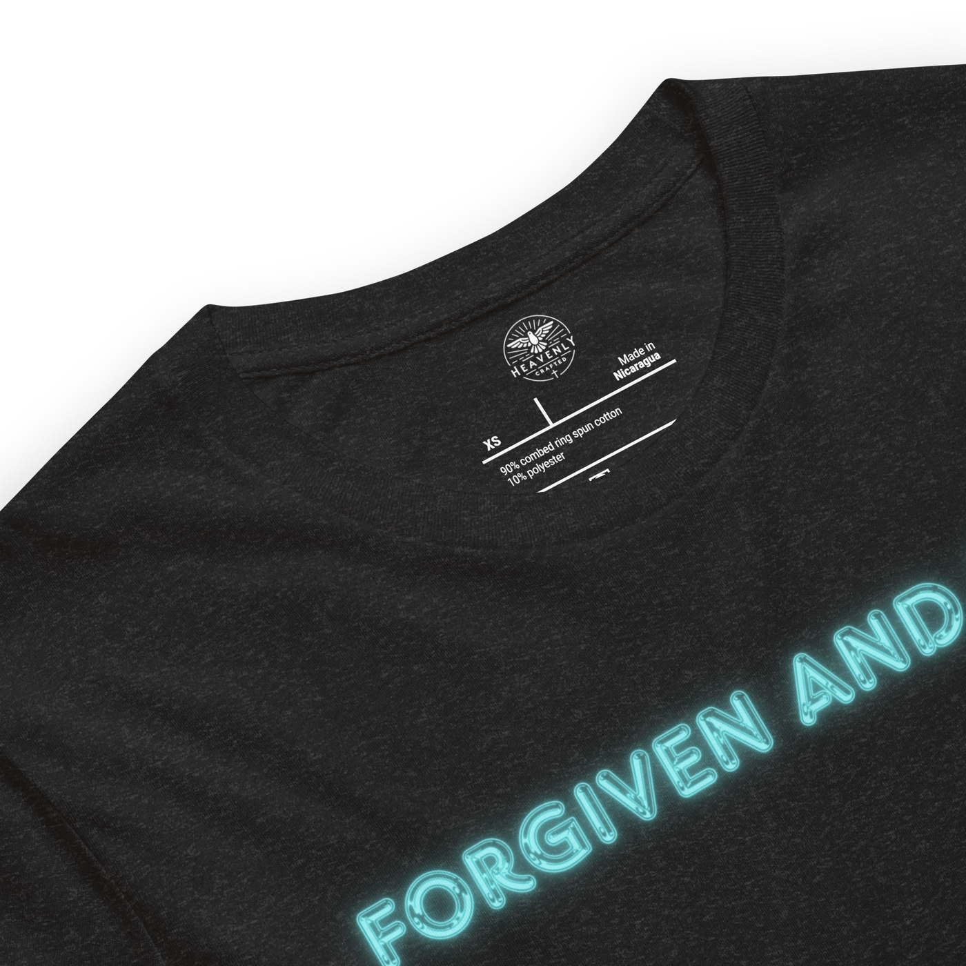 Forgiven and Free Ephesians 1:7 Christian T-Shirt — black, label and care detail