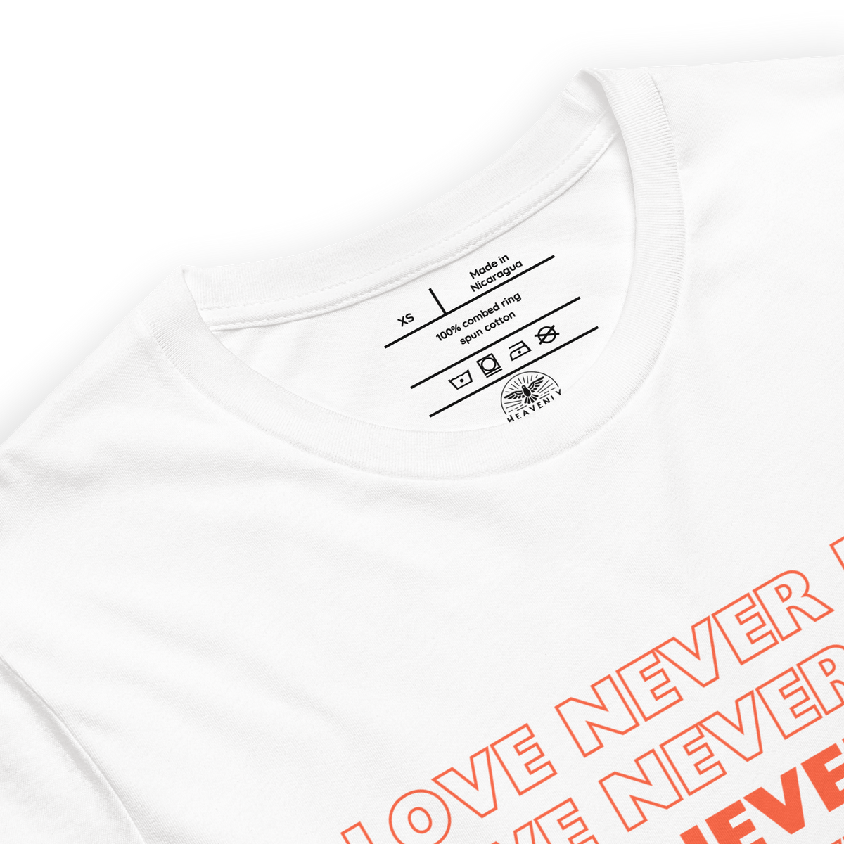 Love Never Fails 1 Corinthians 13:8 Christian T-Shirt — white, label and care detail 2