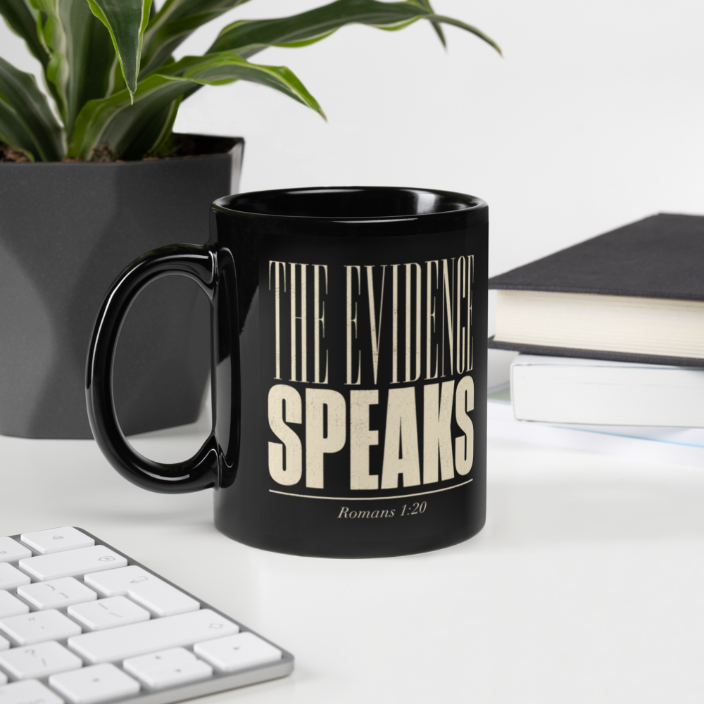 The Evidence Speaks Romans 1:20 Black Christian Mug – 11 oz — black, left handle on left. Gospel Noir Christian coffee mug by Heavenly Crafted, Christmas Christian gift