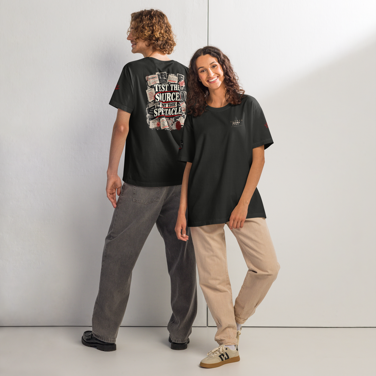 Test the Source Not the Spectacle II Christian oversized T-shirt — washed black, front-and-back product view